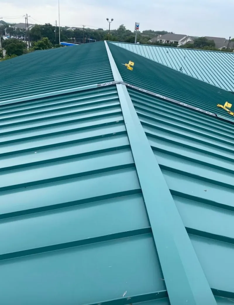 Green commercial metal roof ridge and valley for Metal Roof Repair in Anderson