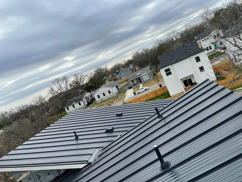 Standing seam metal roof panels with vents for Skylight Repair in Anderson